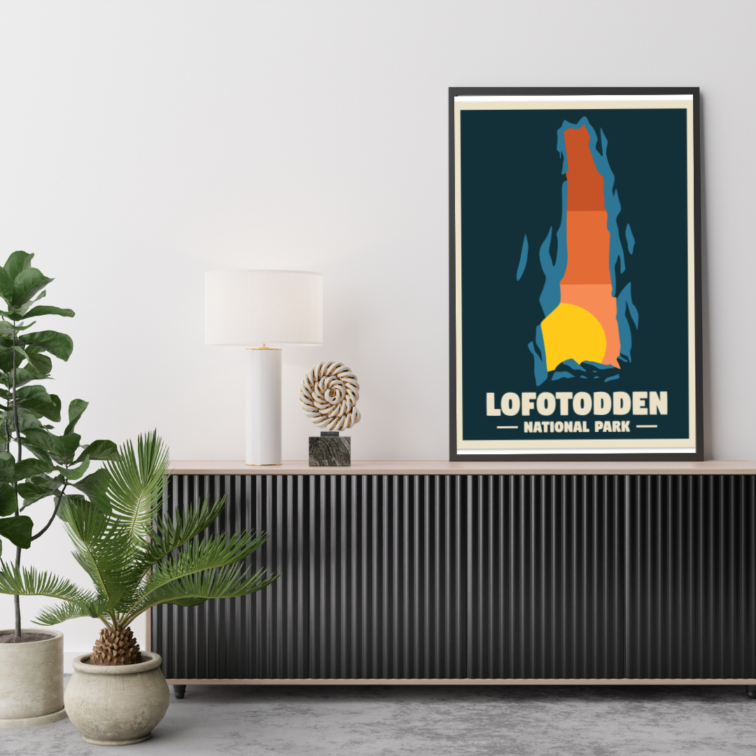 Framed poster of Refsvika cave in the Lofotodden National Park in Lofoten, on a wall above a console table with plants.