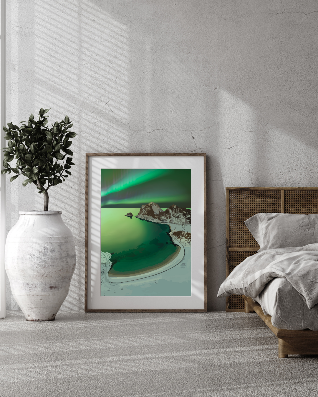 Framed artwork from Haukland beach in Lofoten - the sky has dancing aurora in green. It is in a modern bedroom setting