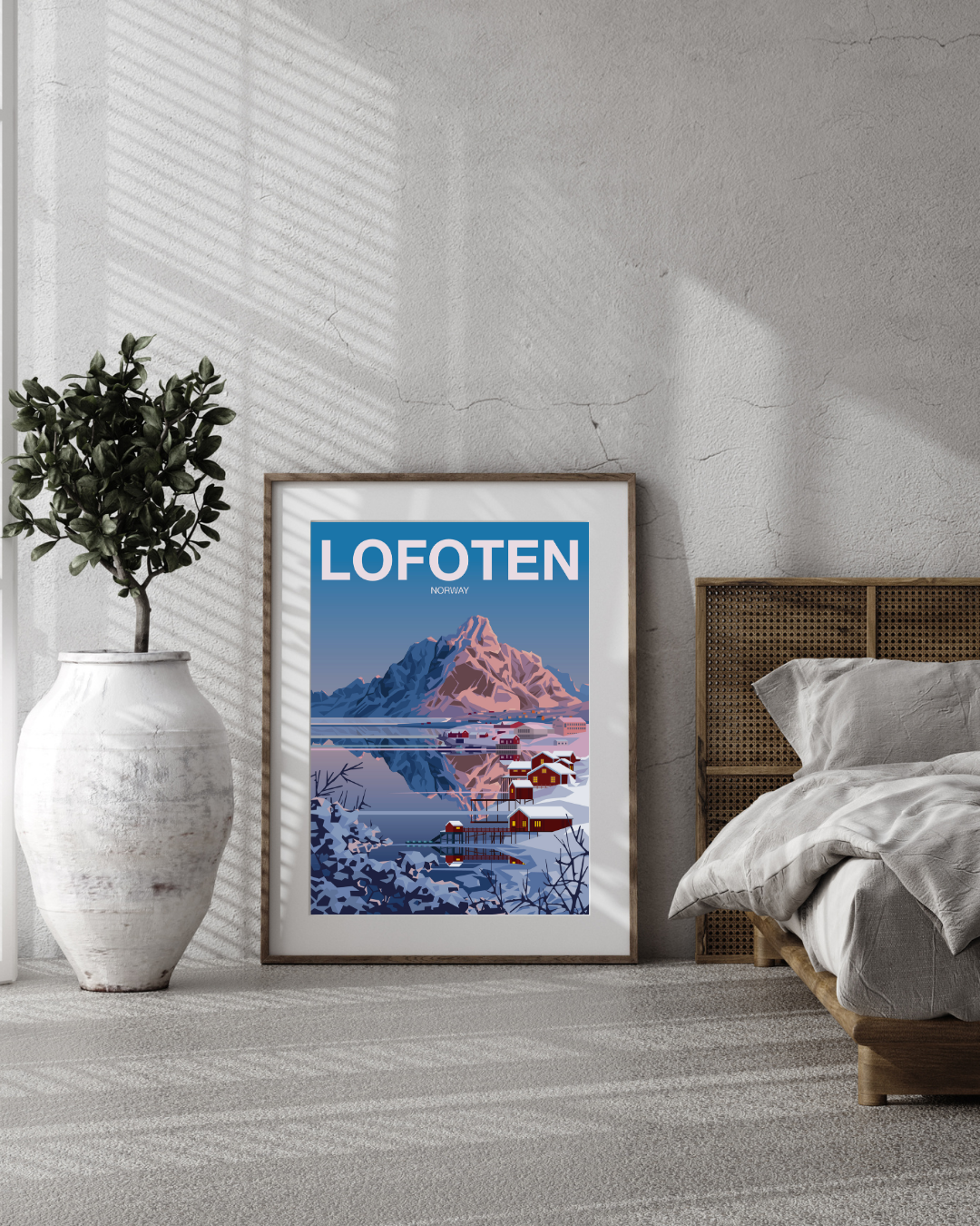Framed poster from Reine in Lofoten, during winter, in a bedroom setting.