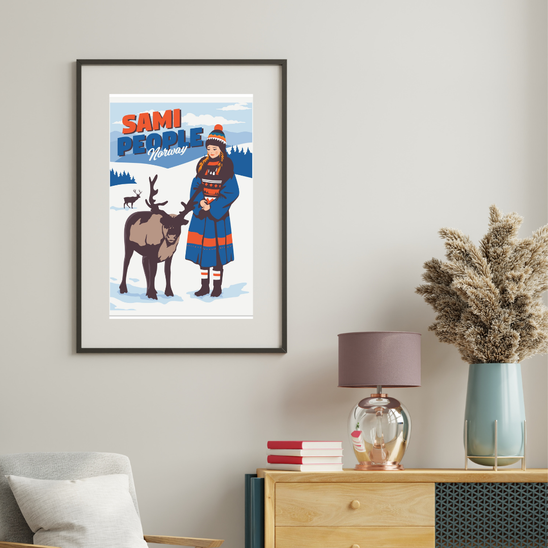 Framed artwork of a Sami person with a reindeer on a wall in a room with a lamp and vase. Colors are blue, red and white and the text says Sami People Norway.