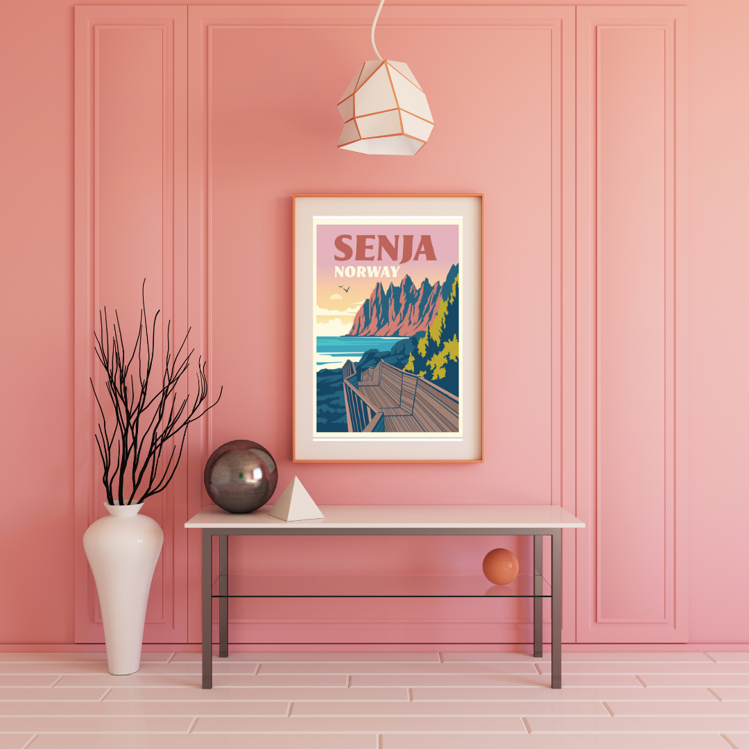 Framed picture on a pink wall. Pastell colors and picture from Devils Teeth at Senja in Norway.