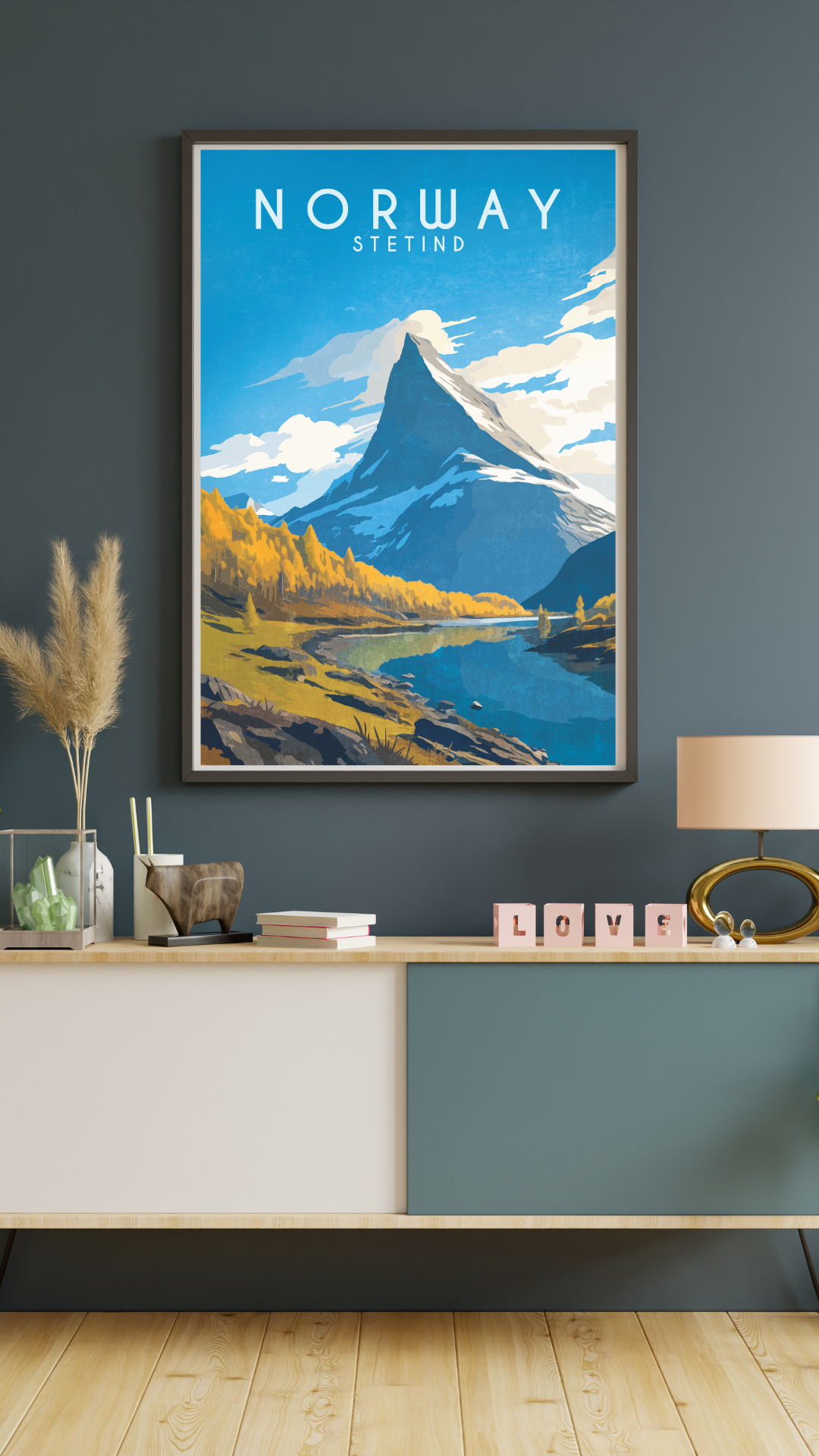 Painted picture from Norways national mountain Stetind. Framed on a grey wall.