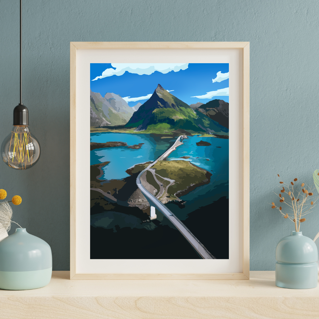 Framed artwork of Volandstinden and the Fredvang bridges in Lofoten. Standing on a wooden shelf with a hanging lamp and two vases.