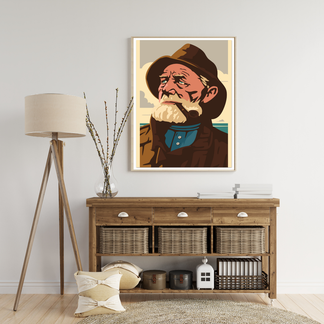 Framed artwork of an old fisherman with beard and with a pipe on a wall above a wooden console table. Brown colors. 