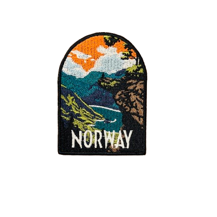 Patch with a person standing on a view point looking down into the beautiful Norwegian fjord. Mountains around. Text says Norway and the colors are orange, white, green and green-blue. 