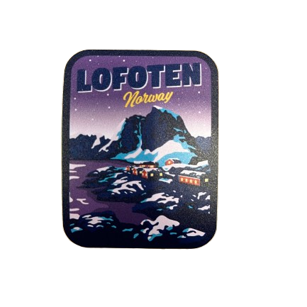 Sticker with purple winter light magic over Hamnøy in Lofoten. Snow on the mountains. 