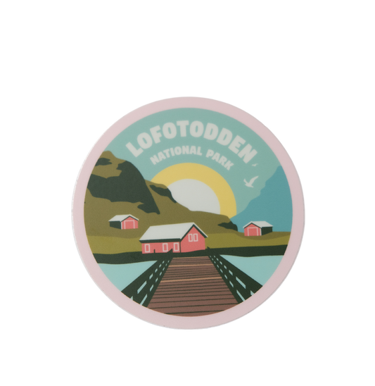 Round sticker from Lofotodden National Park in Lofoten. The sticker has fishermans huts and midnight sun in it.