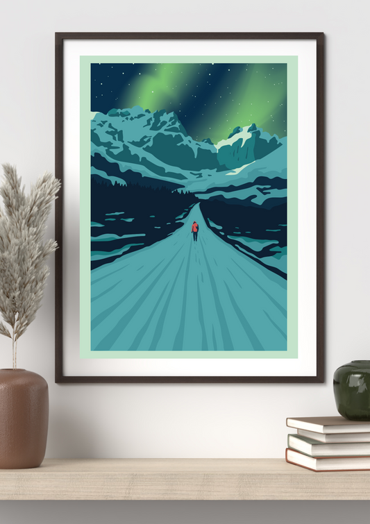 Framed artwork of a person walking on The Road to Nusfjord towards the classic Lofoten mountains under a green aurora sky.