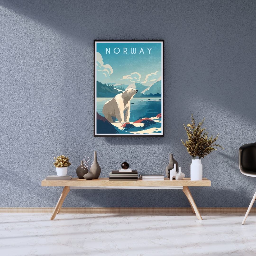 Framed artwork of a polar bear in Norway on a wall above a wooden console table. Colors of the poster is blue and white and the text says Norway. 