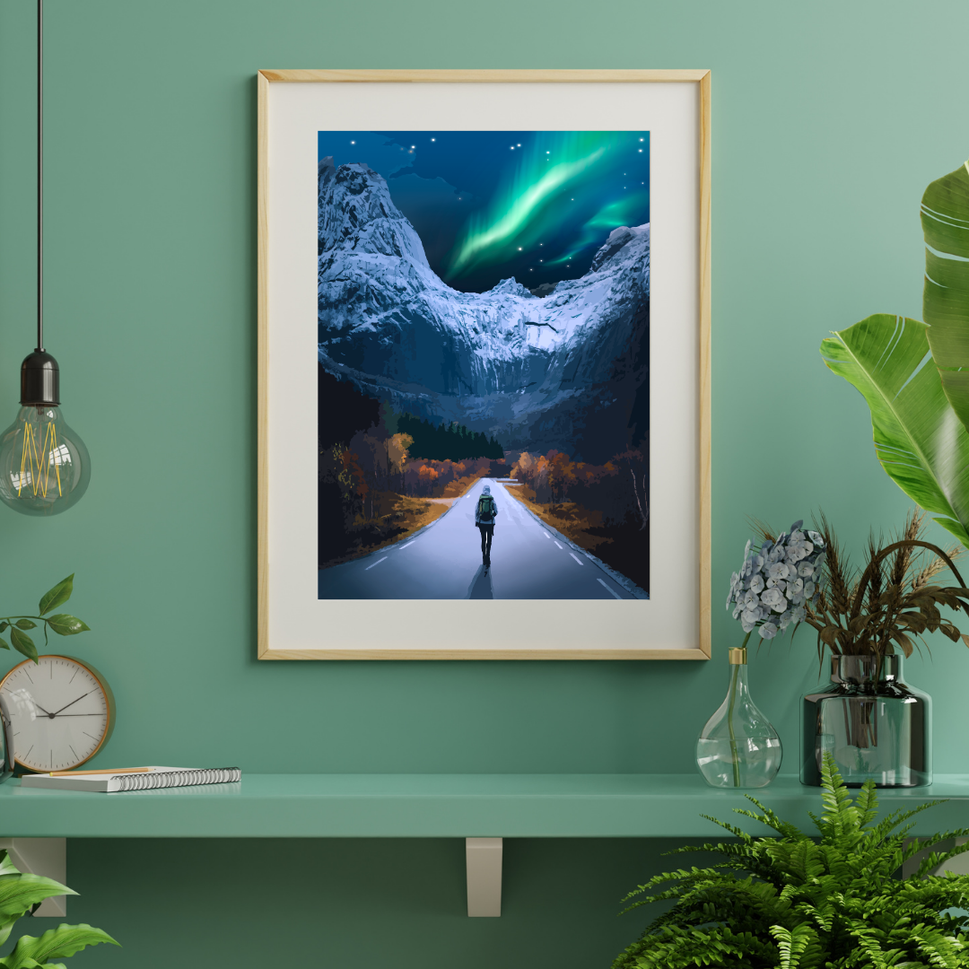 Framed artwork of a person walking on a snowy path, the classic Road to Nusfjord in Lofoten, with Northern Lights above, on a green wall.