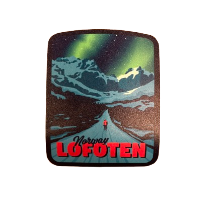 Sticker from the mighty road to Nusfjord in Lofoten. Northern light is dancing on the sky and there are snow on the  mountain tops. 