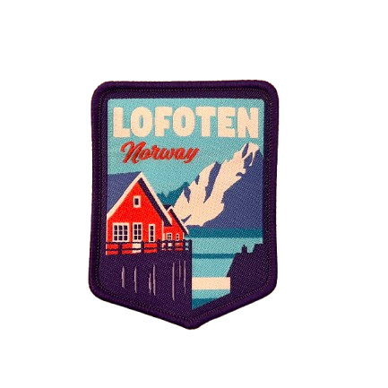 Patch in red, white and blue. Text says Lofoten, Norway. It is the classic fisherman cabin in the front, and the ocean and mountains behind. 