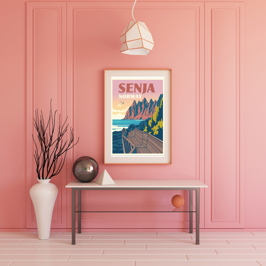 Framed picture on a pink wall. Pastell colors and picture from Devils Teeth at Senja in Norway.