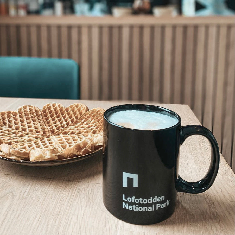 Lofotodden National Park ceramic mug with coffee and waffle